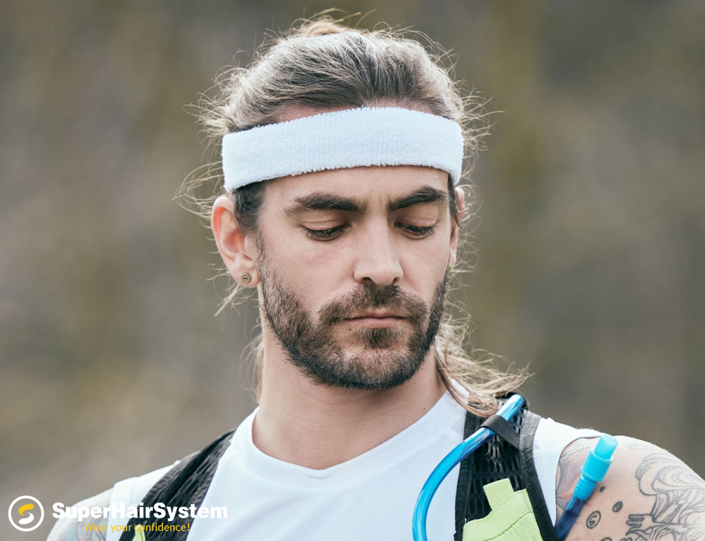 a man with a sweatband