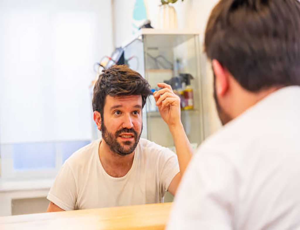 a man with a hair system